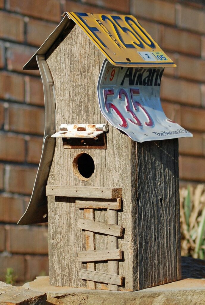 license plate birdhouse with rusty hinge dormer and barnwood 