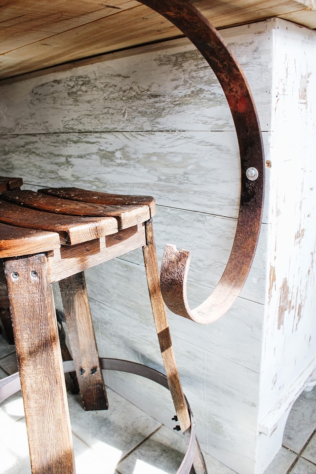 Rusty farm implement on a chippy kitchen island 