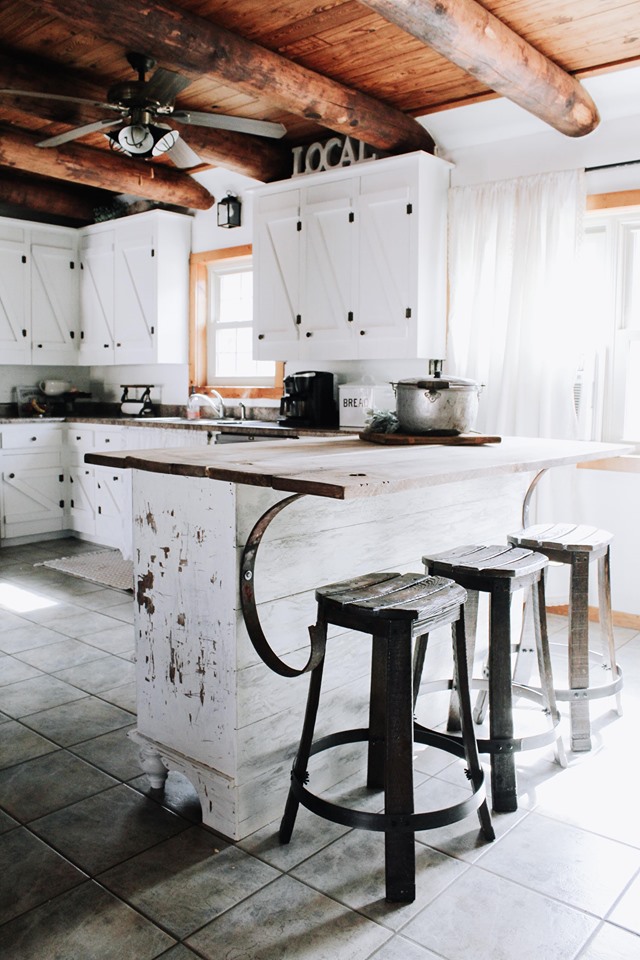 farmhouse kitcchen with white cabinets and a upcycled kitchen island dresser 