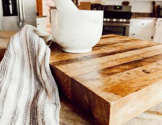wood cutting board with marble mortar and pestal
