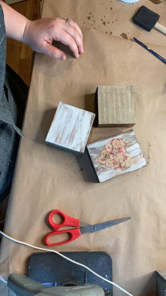 Wood blocks with scrap book paper attached