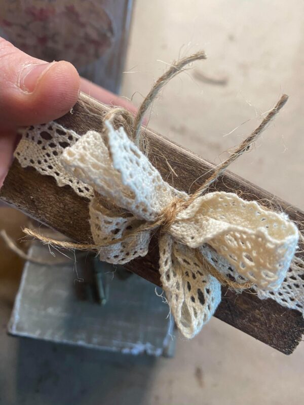 LACE DOLLAR TREE RIBBON ON A WOOD BLOCK