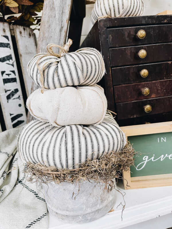 diy faux cement planter with pumpkins